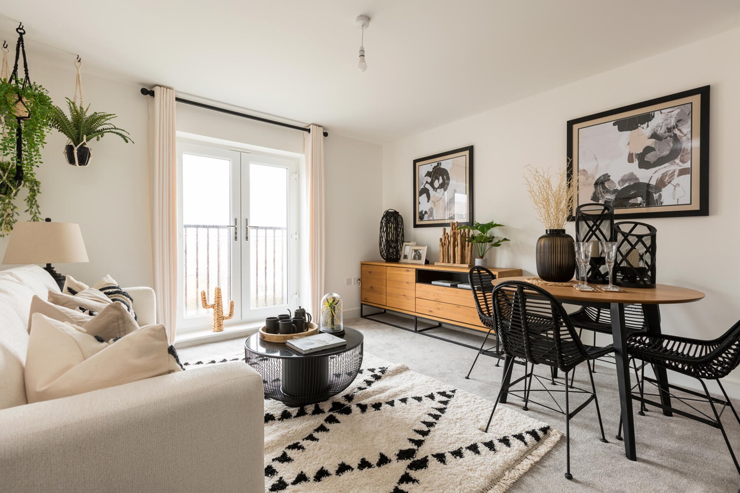 Natural light floods the lounge and dining area