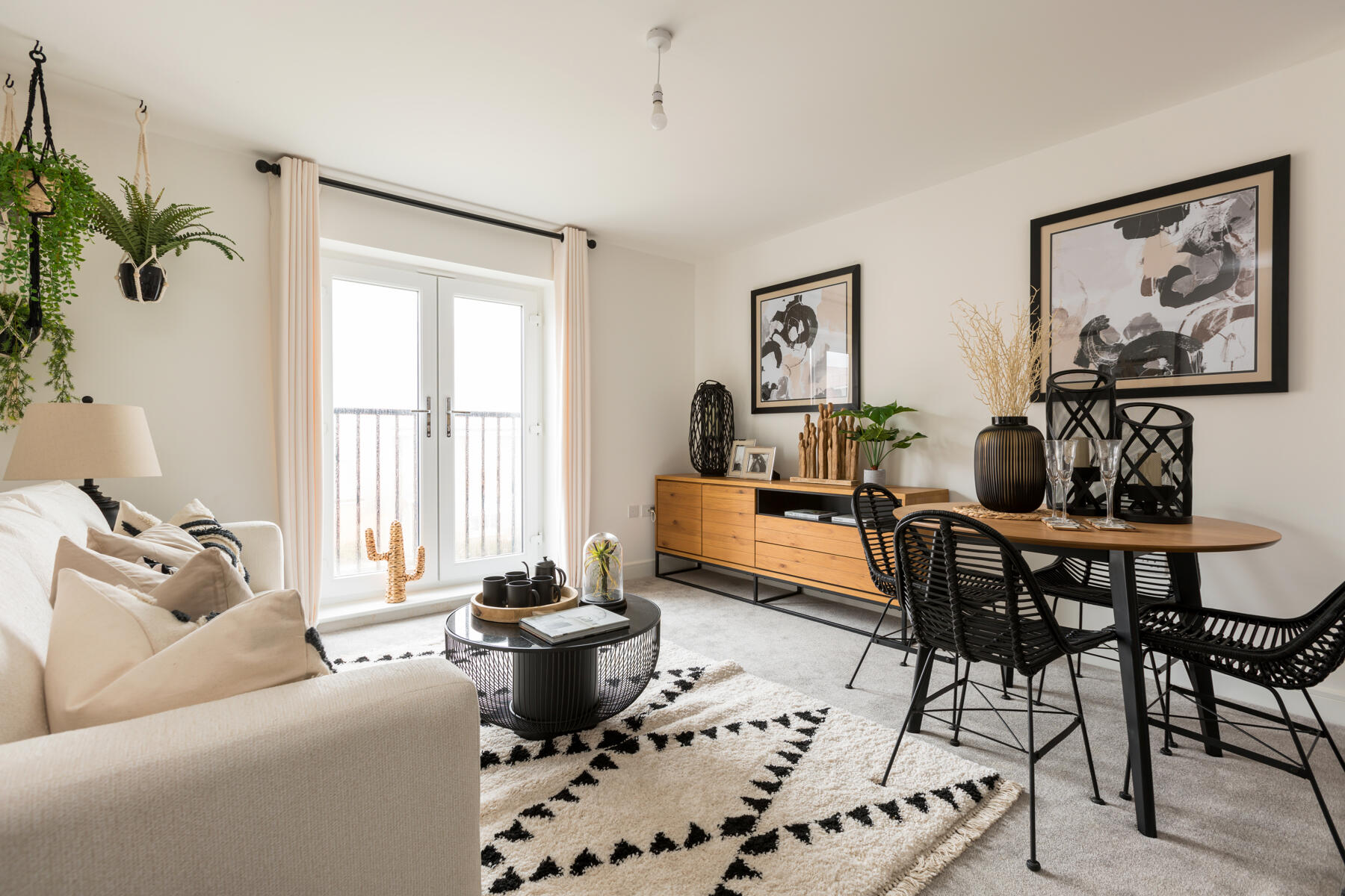 Natural light floods the lounge and dining area