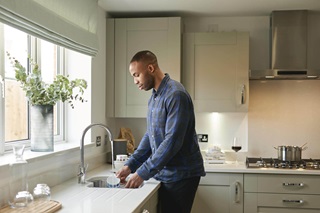 Customer using his new kitchen
