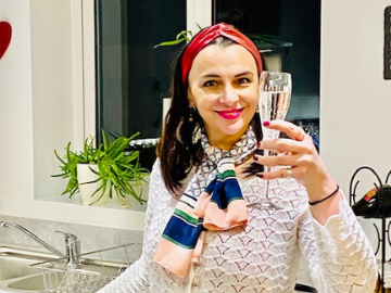 New home owner celebrating with a glass of fizz