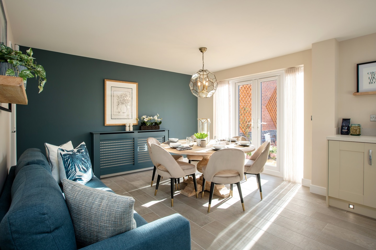 Dining area with green feature wall