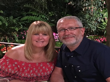 Close up image of a middle aged couple